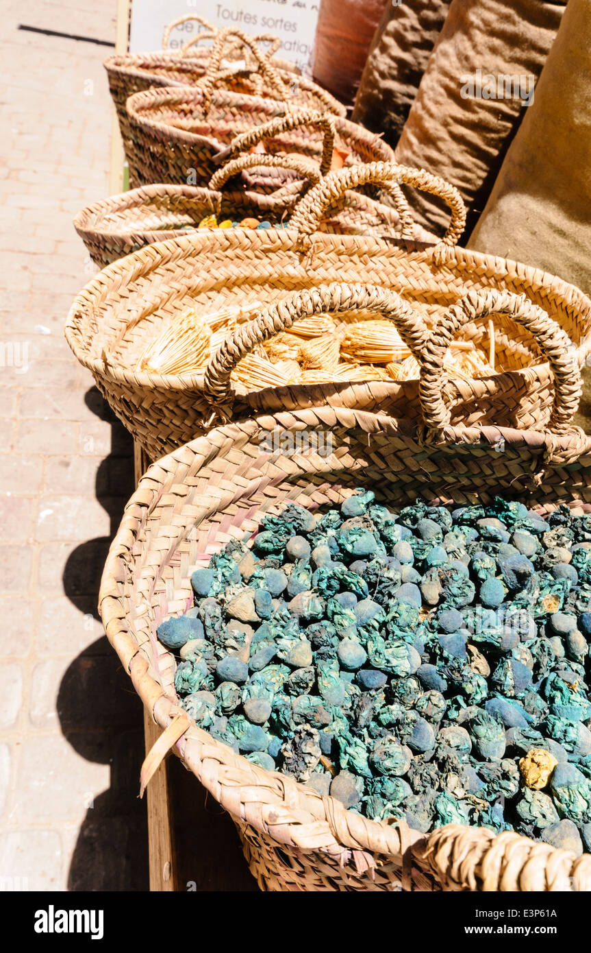 Baskets containing dried fruit, nuts and grain at a market stall in the