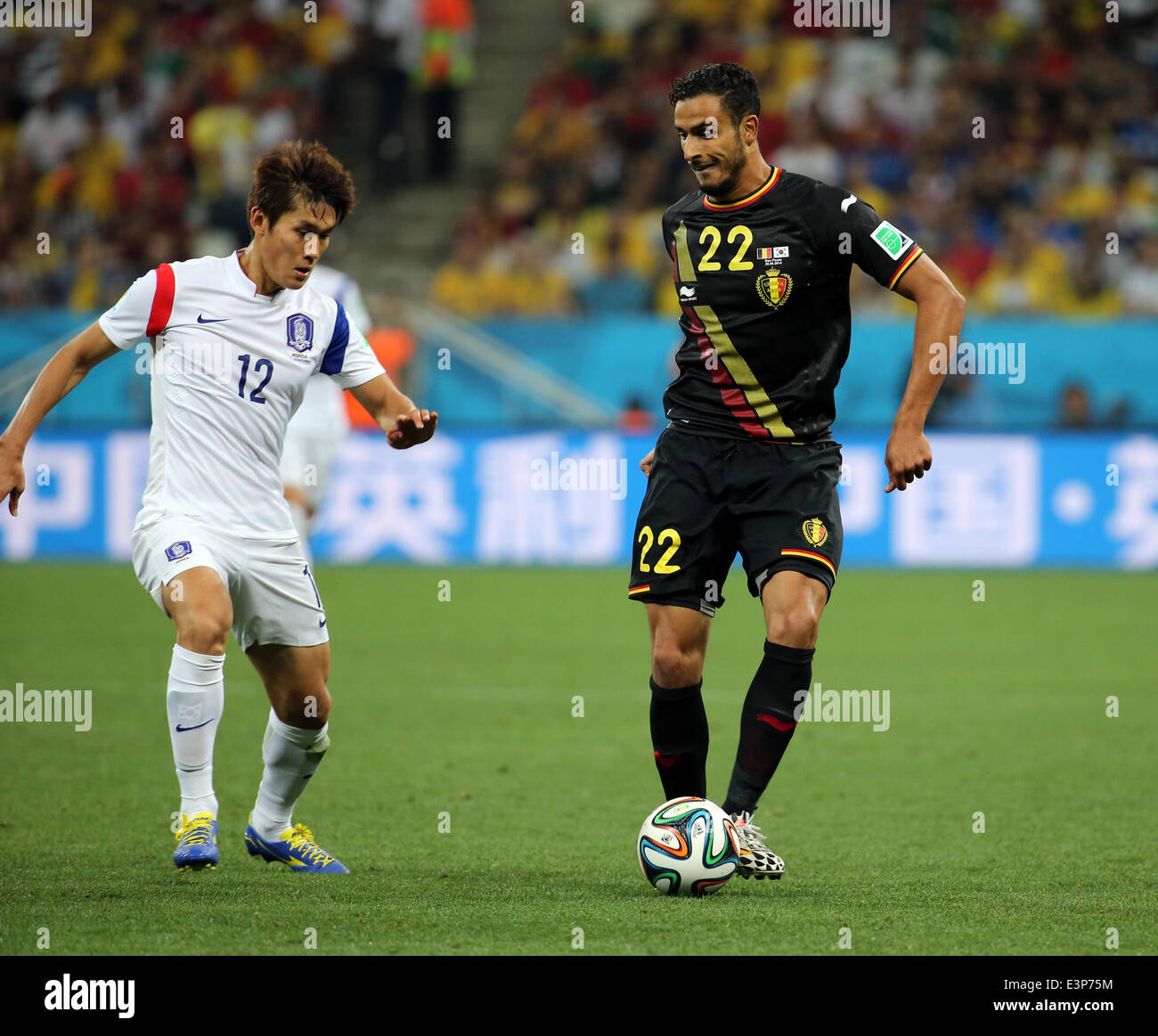 San Paulo, Brazil. 26th June, 2014. World Cup finals 2014, group stages. South Korea versus Belgium Chadli controls the ball against Lee Yong Credit:  Action Plus Sports/Alamy Live News Stock Photo