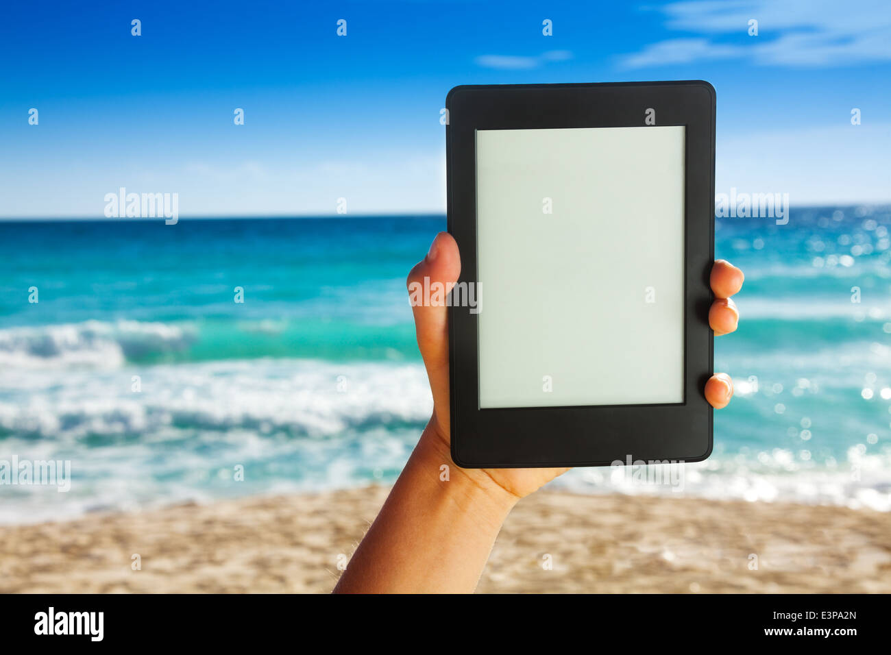 Man hand holding electronic device for reading Stock Photo