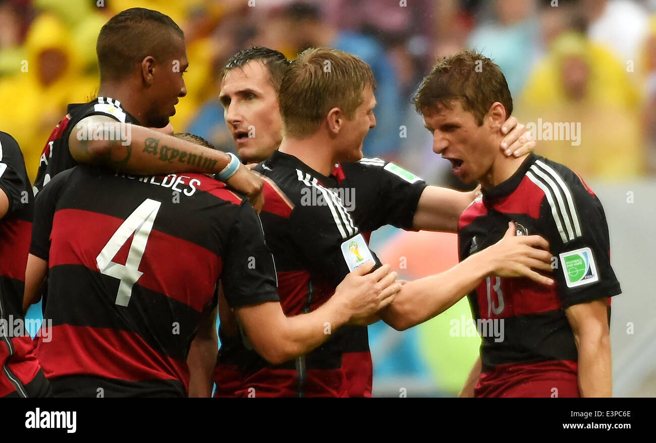 Recife, Brazil. 26th June, 2014. Germany's Jerome Boateng, Benedikt Howedes, Miroslav Klose and Bastian Schweinsteiger (from 1st L to 4th L)celebrate for Thomas Muller's goal (1st R) during a Group G match between the U.S. and Germany of 2014 FIFA World Cup at the Arena Pernambuco Stadium in Recife, Brazil, on June 26, 2014. Credit:  Guo Yong/Xinhua/Alamy Live News Stock Photo