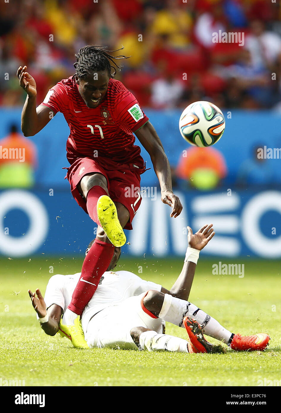 Brasilia, Brazil. 26th June, 2014. Portugal's Eder (up) passes the ball during a Group G match between Portugal and Ghana of 2014 FIFA World Cup at the Estadio Nacional Stadium in Brasilia, Brazil, June 26, 2014. Credit:  Liu Bin/Xinhua/Alamy Live News Stock Photo