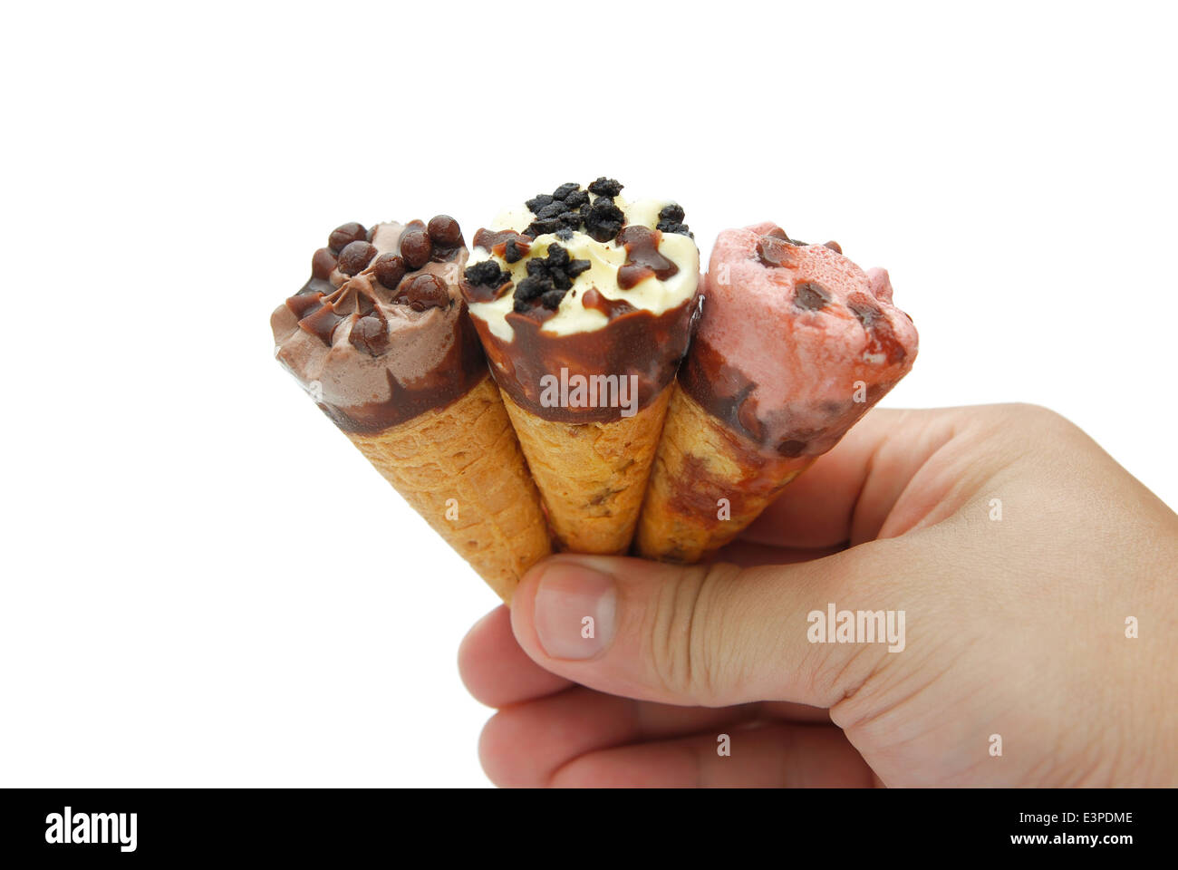 hand holding 3 funny size ice cream cones with clipping path Stock Photo