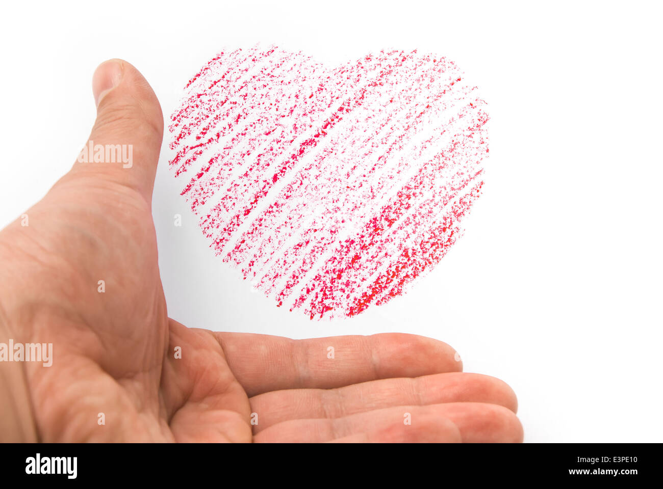 hand holding a heart sketch Stock Photo
