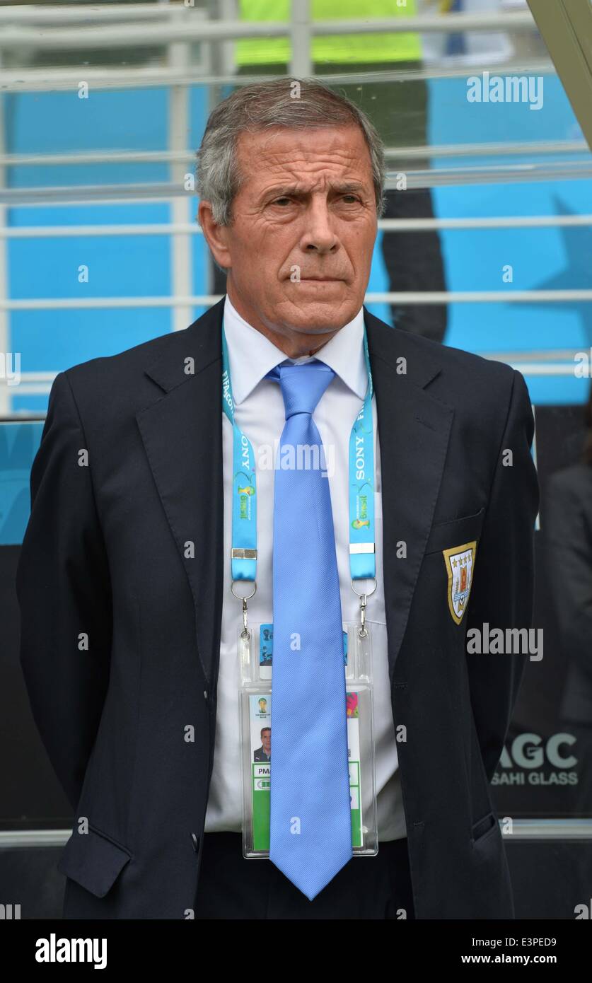 Natal, Brazil. 24th June, 2014. Uruguay's coach Oscar Washington Tabarez reacts before a Group D match between Italy and Uruguay of 2014 FIFA World Cup at the Estadio das Dunas Stadium in Natal, Brazil, June 24, 2014. © Guo Yong/Xinhua/Alamy Live News Stock Photo