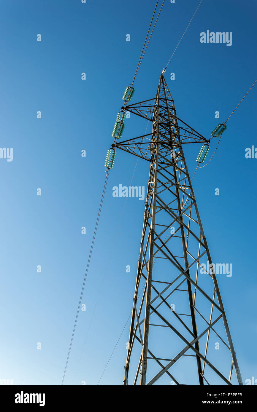 High-voltage electricity pylons, view from below Stock Photo