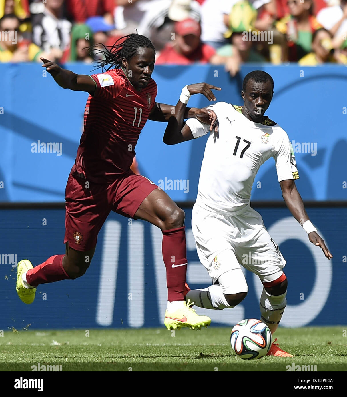 Brasilia, Brazil. 26th June, 2014. Portugal's Eder (L) vies with Ghana's Mohammed Rabiu during a Group G match between Portugal and Ghana of 2014 FIFA World Cup at the Estadio Nacional Stadium in Brasilia, Brazil, June 26, 2014. © Qi Heng/Xinhua/Alamy Live News Stock Photo