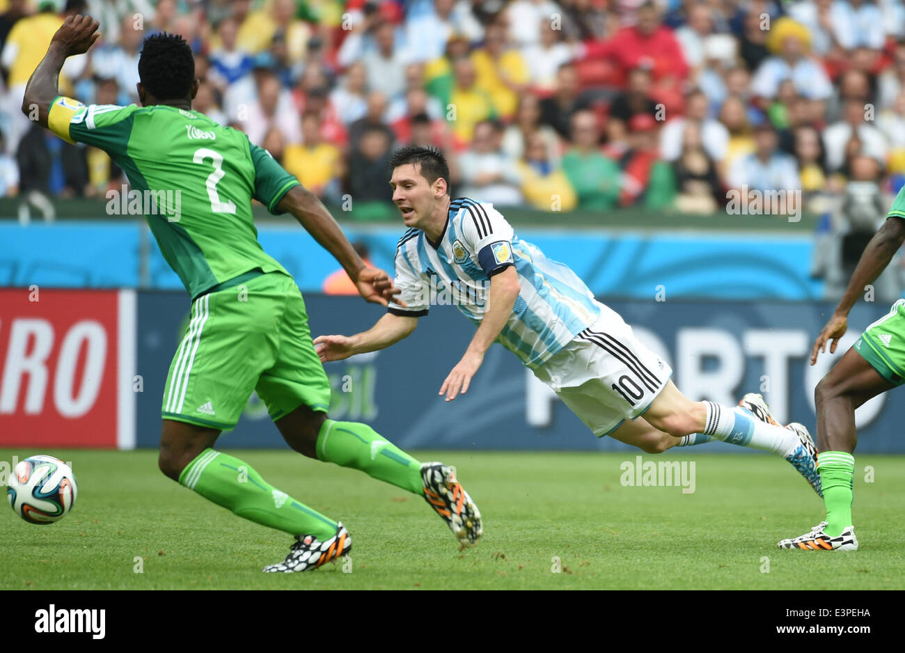 Porto Alegre, Brazil. 25th June, 2014. Argentina's Lionel Messi (C) strives for the ball during a Group F match between Nigeria and Argentina of 2014 FIFA World Cup at the Estadio Beira-Rio Stadium in Porto Alegre, Brazil, on June 25, 2014. © Li Ga/Xinhua/Alamy Live News Stock Photo