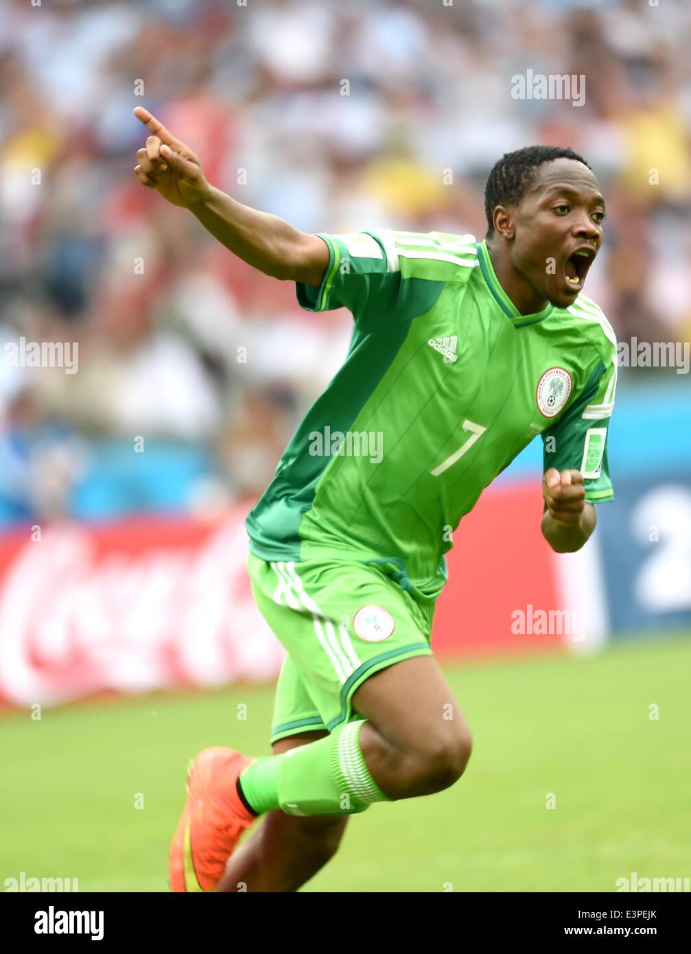 Porto Alegre, Brazil. 25th June, 2014. Nigeria's Ahmed Musa celebrates for scoring his second goal during a Group F match between Nigeria and Argentina of 2014 FIFA World Cup at the Estadio Beira-Rio Stadium in Porto Alegre, Brazil, on June 25, 2014. © Li Ga/Xinhua/Alamy Live News Stock Photo