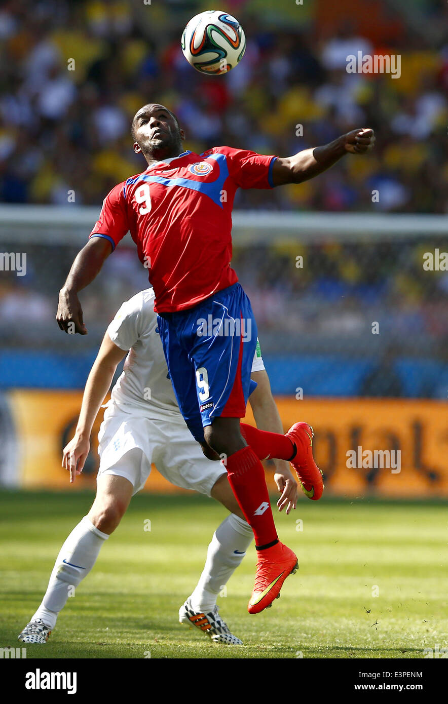 Belo Horizonte, Brazil. 24th June, 2014. Costa Rica's Joel Campbell (front) competes for a header during a Group D match between Costa Rica and England of 2014 FIFA World Cup at the Estadio Mineirao Stadium in Belo Horizonte, Brazil, on June 24, 2014. © Liu Bin/Xinhua/Alamy Live News Stock Photo