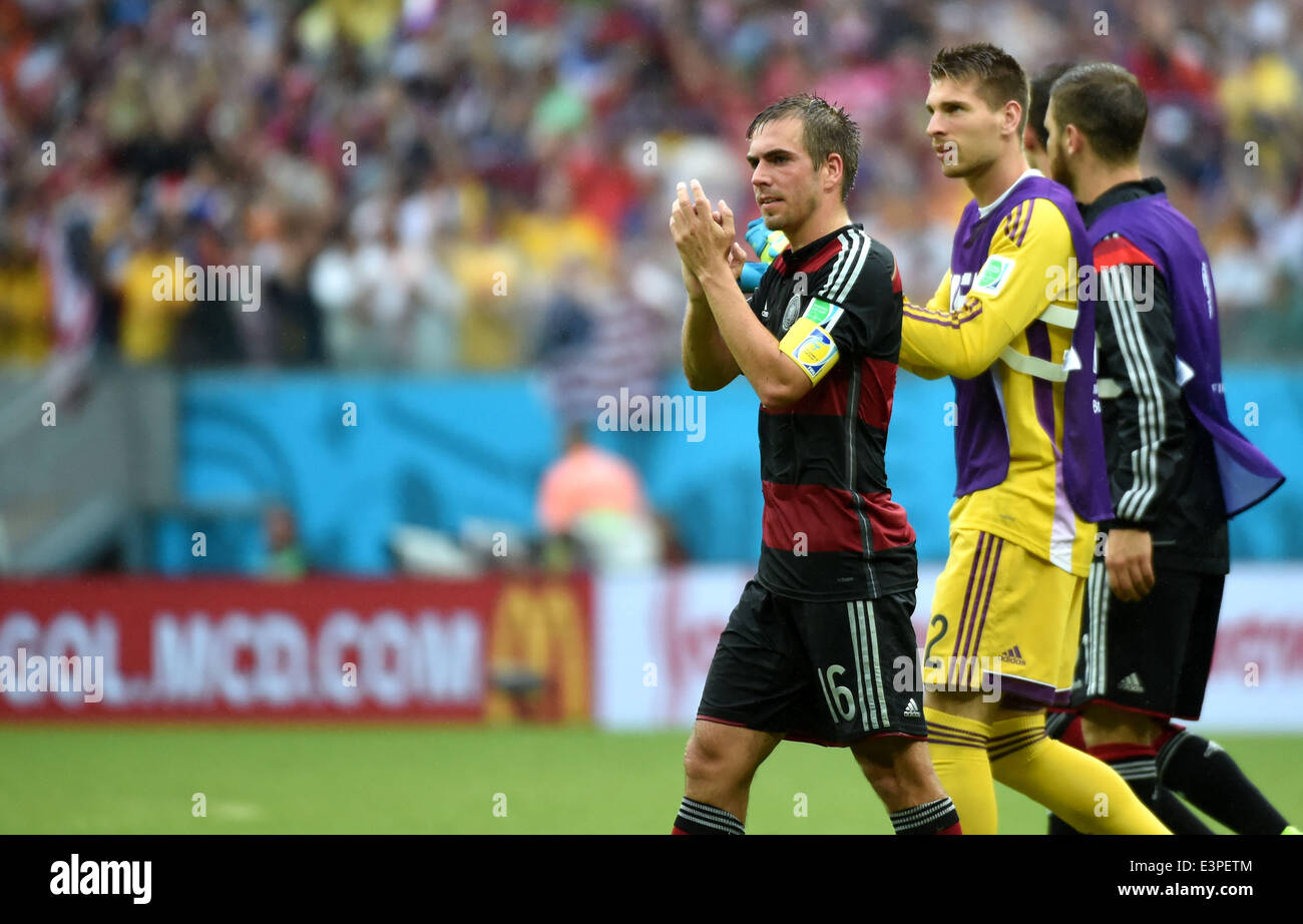 Recife, Brazil. 26th June, 2014. Philipp Lahm (1st L) applauds the audience after a Group G match between the U.S. and Germany of 2014 FIFA World Cup at the Arena Pernambuco Stadium in Recife, Brazil, on June 26, 2014. Germany won 1-0 over the U.S. on Thursday. Germany and the U.S. enter Round of 16 from Group G. Credit:  Guo Yong/Xinhua/Alamy Live News Stock Photo