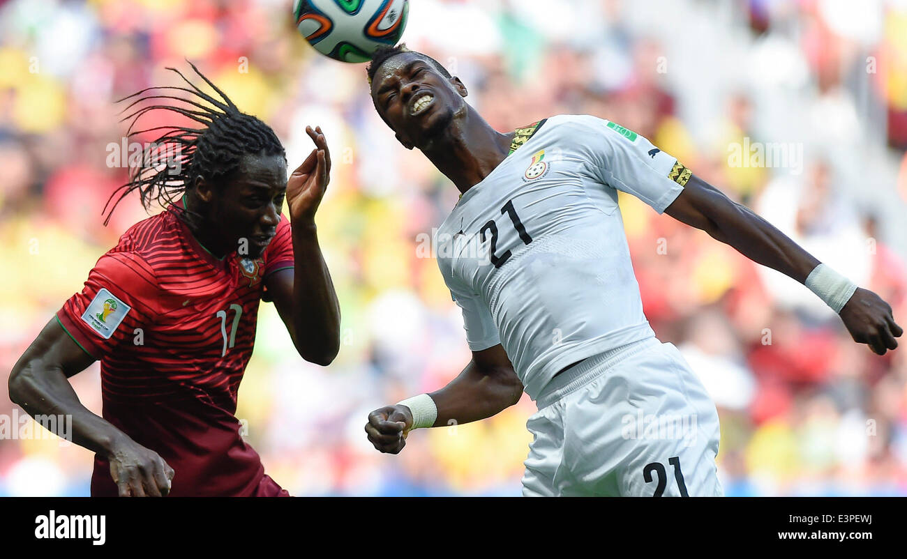 Brasilia, Brazil. 26th June, 2014. Portugal's Eder (L) competes with Ghana's John Boye during a Group G match between Portugal and Ghana of 2014 FIFA World Cup at the Estadio Nacional Stadium in Brasilia, Brazil, June 26, 2014. Portugal won 2-1 over Ghana on Thursday. © Qi Heng/Xinhua/Alamy Live News Stock Photo