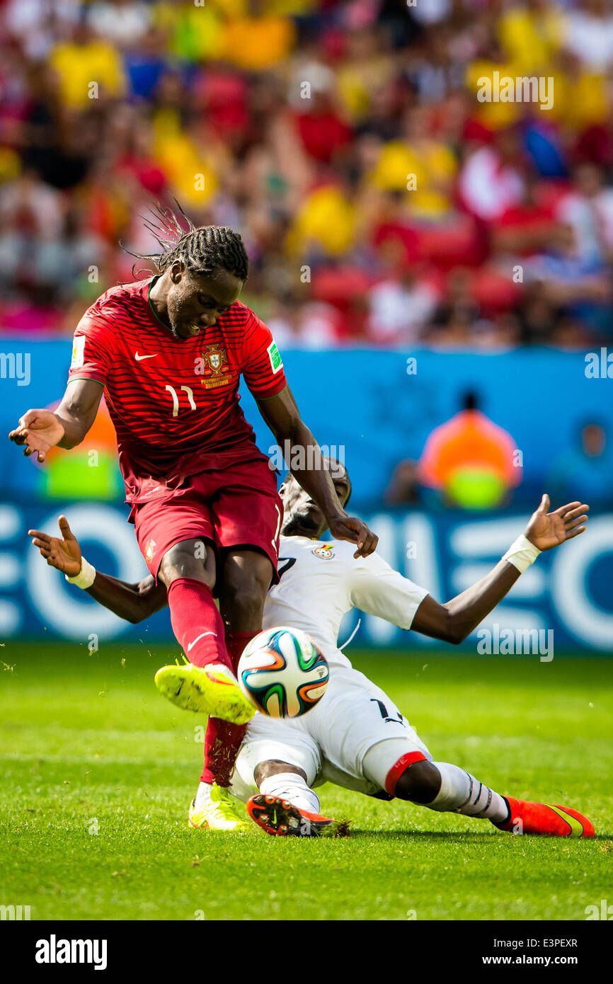 Brasilia, Brazil. 26th June, 2014. Portugal's Eder (L) passes the ball during a Group G match between Portugal and Ghana of 2014 FIFA World Cup at the Estadio Nacional Stadium in Brasilia, Brazil, June 26, 2014.Portugal won 2-1 over Ghana on Thursday. © Liu Bin/Xinhua/Alamy Live News Stock Photo