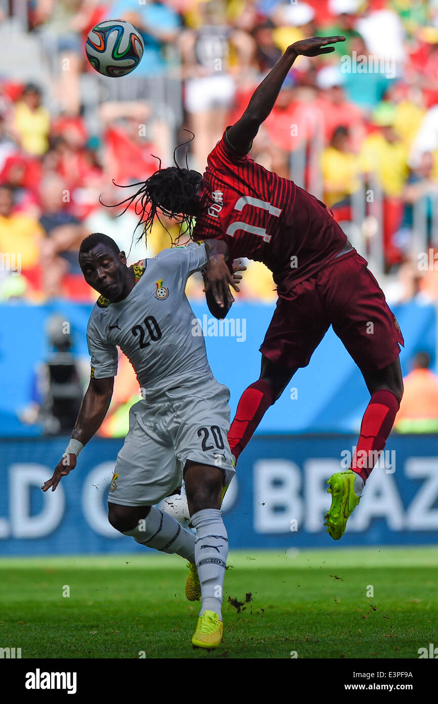 Brasilia, Brazil. 26th June, 2014. Portugal's Eder (R) vies with Ghana's Kwadwo Asamoah during a Group G match between Portugal and Ghana of 2014 FIFA World Cup at the Estadio Nacional Stadium in Brasilia, Brazil, June 26, 2014. Portugal won 2-1 over Ghana on Thursday. © Qi Heng/Xinhua/Alamy Live News Stock Photo