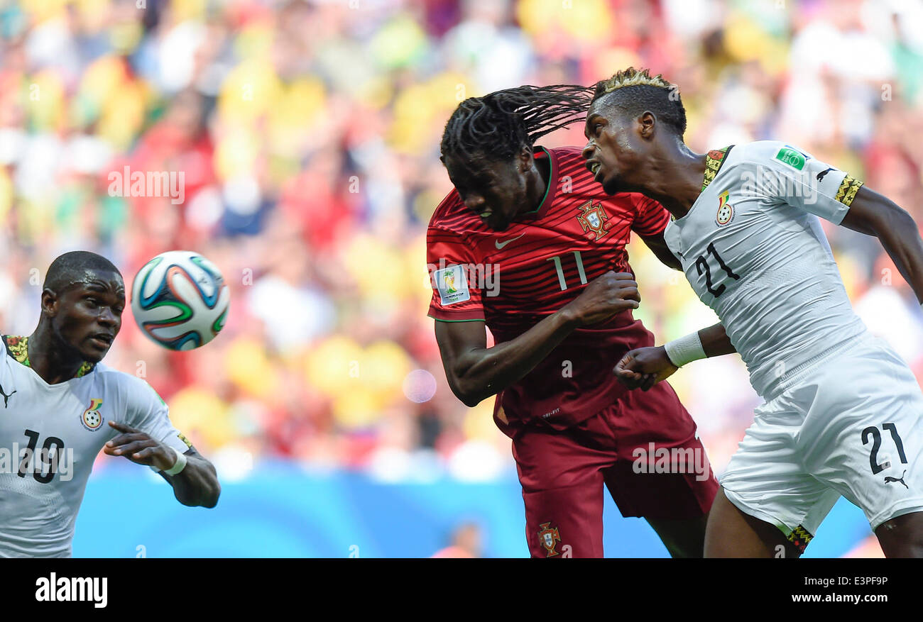 Brasilia, Brazil. 26th June, 2014. Portugal's Eder (C) competes for a header with Ghana's John Boye (R) and Jonathan Mensah (L) during a Group G match between Portugal and Ghana of 2014 FIFA World Cup at the Estadio Nacional Stadium in Brasilia, Brazil, June 26, 2014. Portugal won 2-1 over Ghana on Thursday. © Qi Heng/Xinhua/Alamy Live News Stock Photo