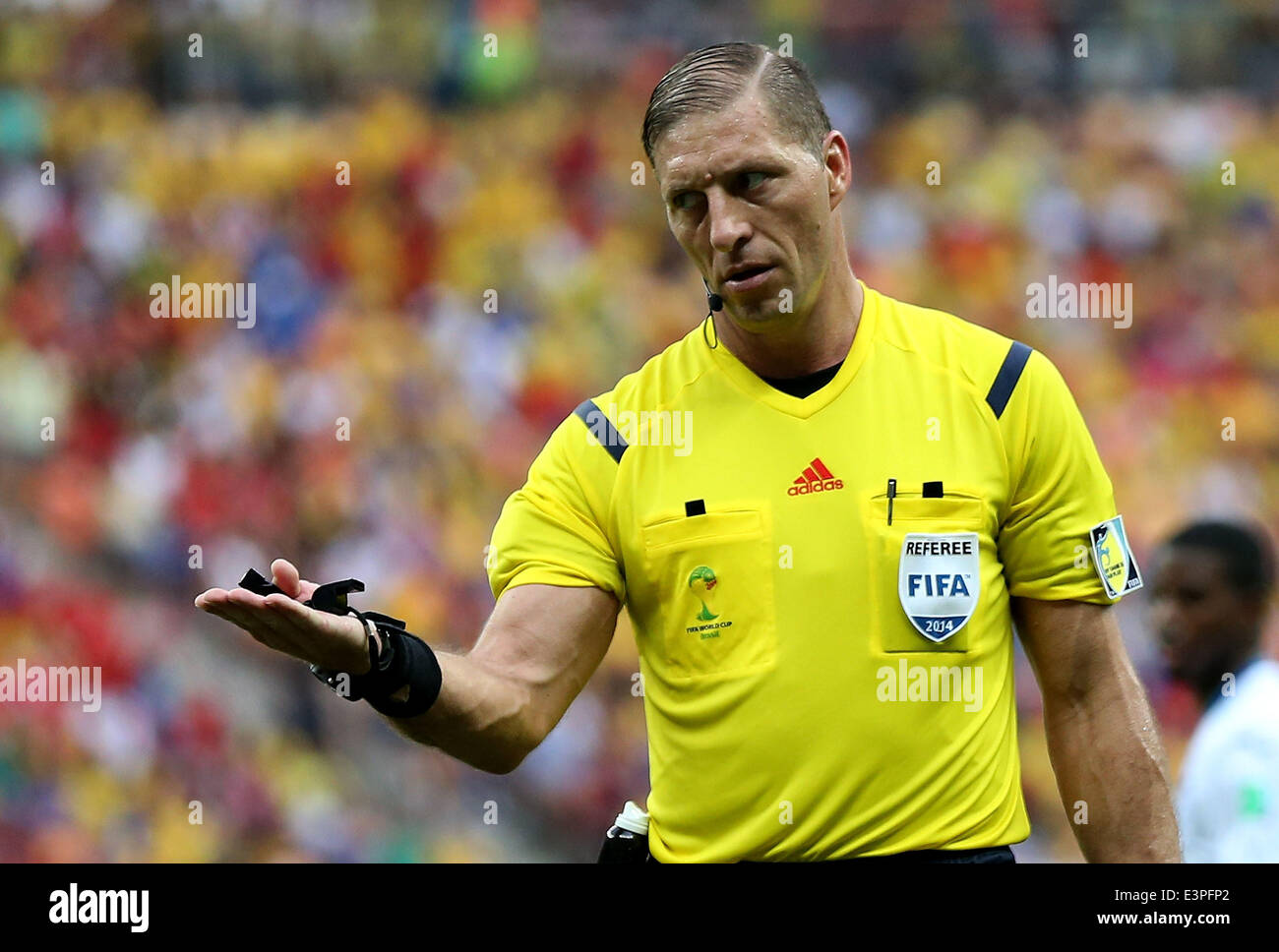 (140625) -- MANAUS, June 25, 2014 (Xinhua) -- Argentina's referee Nestor Pitana calls a foul during a Group E match between Honduras and Switzerland of 2014 FIFA World Cup at the Arena Amazonia Stadium in Manaus, Brazil, on June 25, 2014. Switzerland won 3-0 over Honduras on Wednesday. (Xinhua/Li Ming)(pcy) Stock Photo