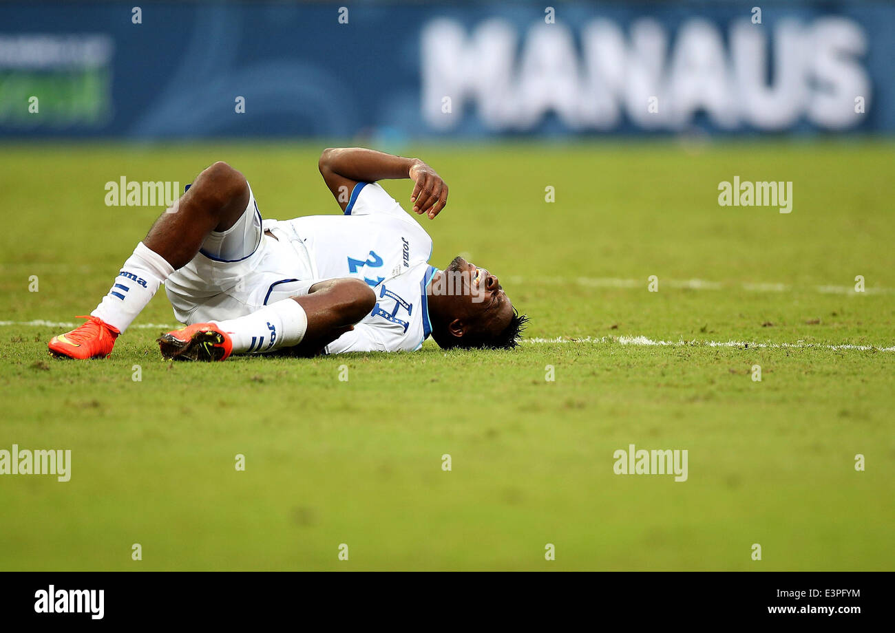 (140625) -- MANAUS, June 25, 2014 (Xinhua) -- Honduras' Marvin Chavez lies down after being hit during a Group E match between Honduras and Switzerland of 2014 FIFA World Cup at the Arena Amazonia Stadium in Manaus, Brazil, on June 25, 2014. Switzerland won 3-0 over Honduras on Wednesday. (Xinhua/Li Ming)(pcy) Stock Photo