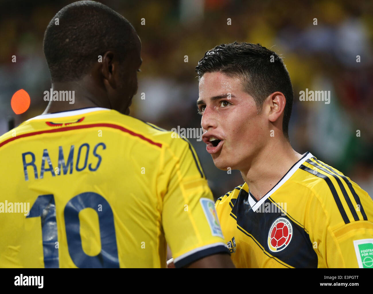 (140624) -- CUIABA, June 24, 2014 (Xinhua) -- Colombia's James Rodriguez (R) celebrates the goal during a Group C match between Japan and Colombia of 2014 FIFA World Cup at the Arena Pantanal Stadium in Cuiaba, Brazil, June 24, 2014. (Xinhua/Li Ming) Stock Photo