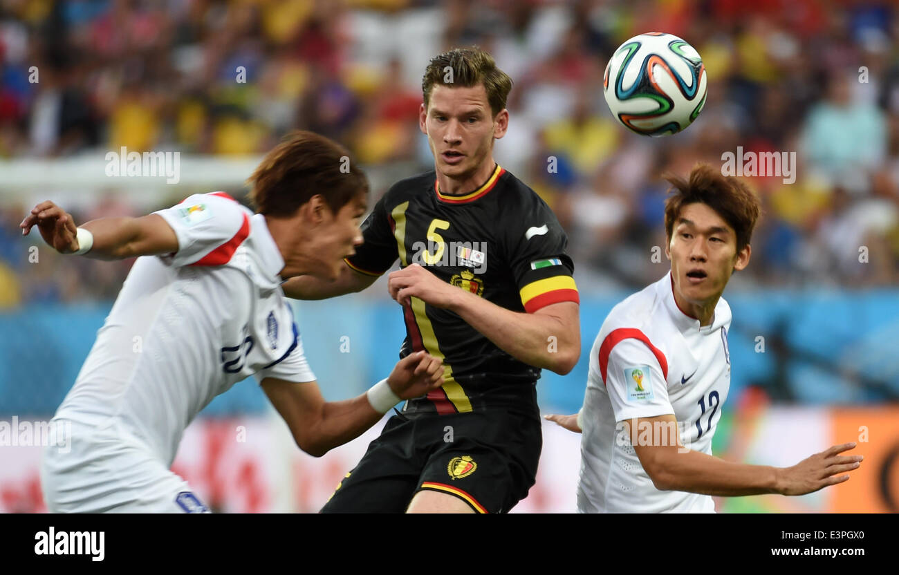 (140626) -- SAO PAULO, June 26, 2014 (Xinhua) -- Belgium's Jan Vertonghen (C) vies with Korea Republic's Hong Jeong Ho (L) and Lee Yong during a Group H match between Korea Republic and Belgium of 2014 FIFA World Cup at the Arena de Sao Paulo Stadium in Sao Paulo, Brazil, on June 26, 2014. Belgium won 1-0 over Korea Republic on Thursday. Belgium and Algeria enter Round of 16 from Group H. (Xinhua/Li Ga)(pcy) Stock Photo