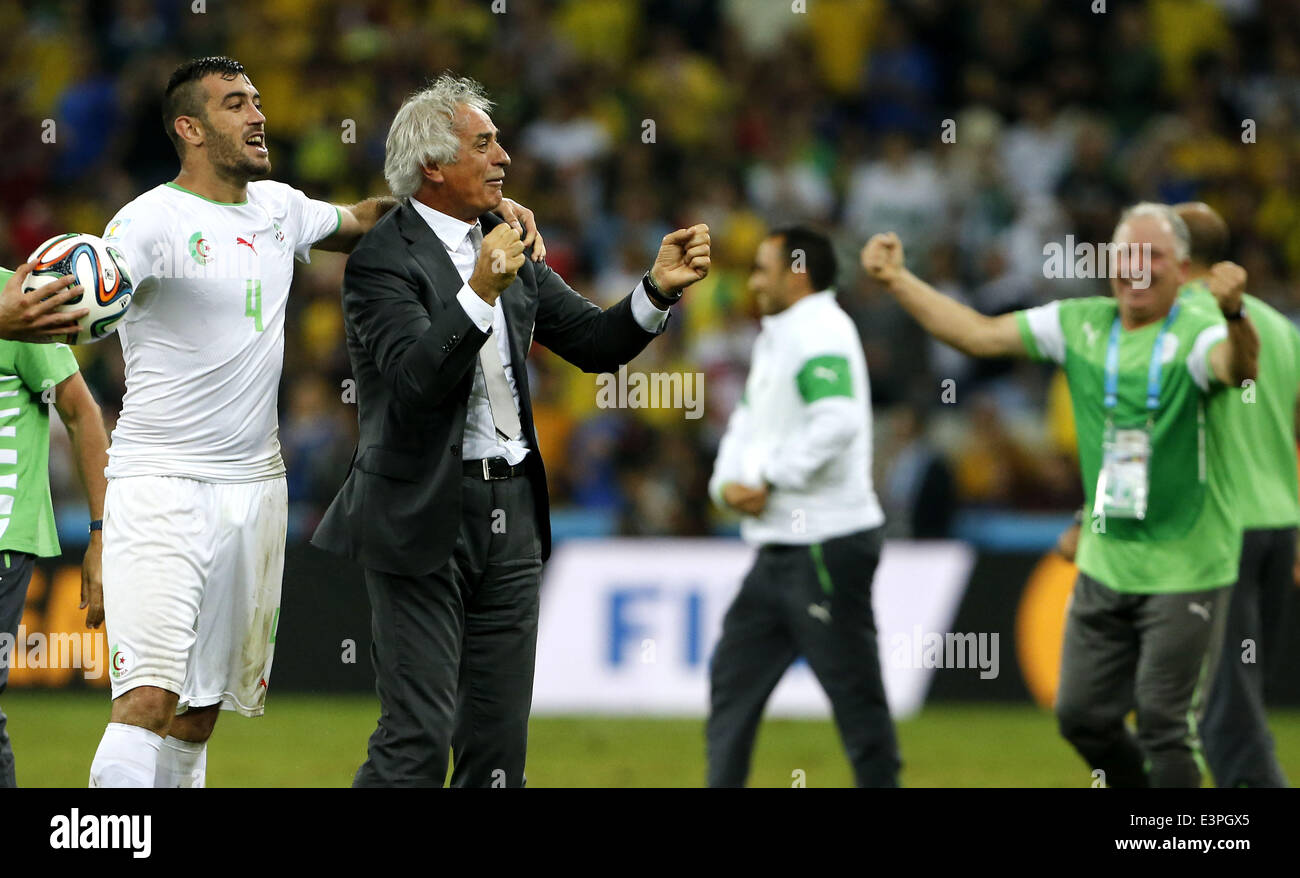 (140626) -- CURITIBA, June 26, 2014 (Xinhua) -- Algeria's coach Vahid Halilhodzic and Essaid Belkalem celebrate after a Group H match between Algeria and Russia of 2014 FIFA World Cup at the Arena da Baixada Stadium in Curitiba, Brazil, June 26, 2014. Algeria enters Round of 16 after the Thursday match which ended in a 1-1 draw.(Xinhua/Zhou Lei) Stock Photo