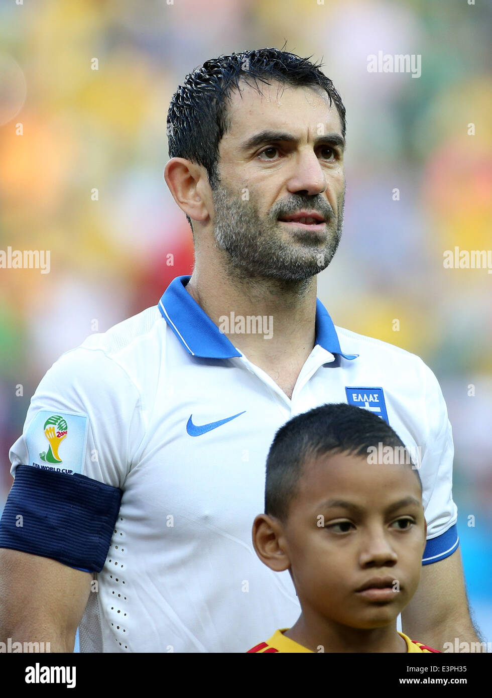 (140624) -- FORTALEZA, June 24, 2014 (Xinhua) -- Greece's captain Giorgos Karagounis is seen prior to a Group C match between Greece and Cote d'Ivoire of 2014 FIFA World Cup at the Estadio Castelao Stadium in Fortaleza, Brazil, June 24, 2014. Greece won 2-1 over Cote d'Ivoire on Tuesday. (Xinhua/Cao Can)(xzj) Stock Photo