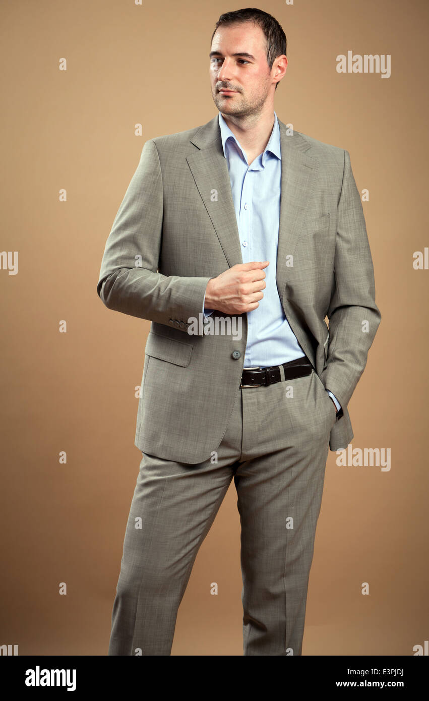 Handsome businessman in a classic suit. Studio shot Stock Photo - Alamy