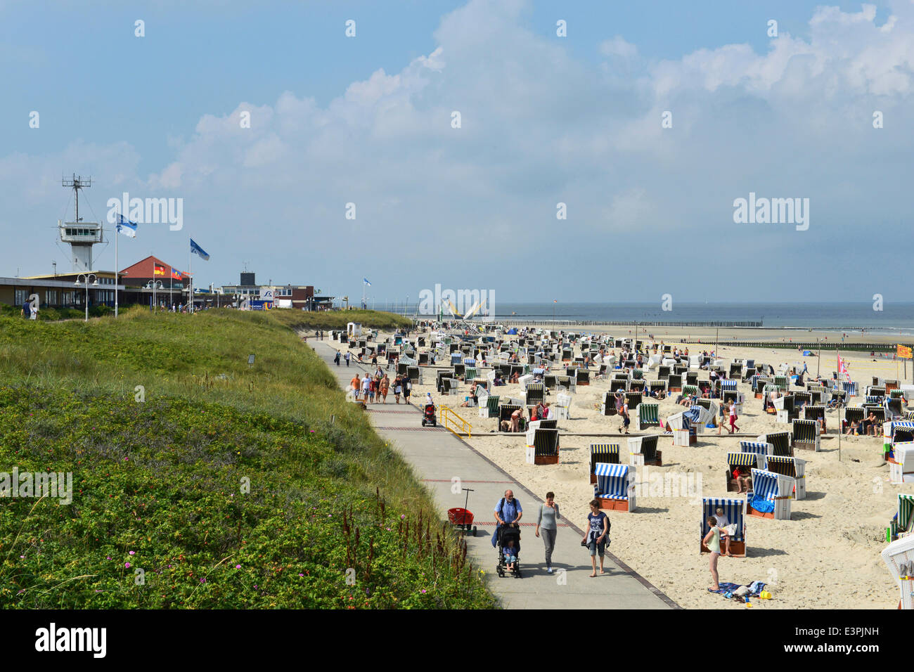 Beach promenade full with holidaymakers and beach chairs, 17 August 2013 Stock Photo