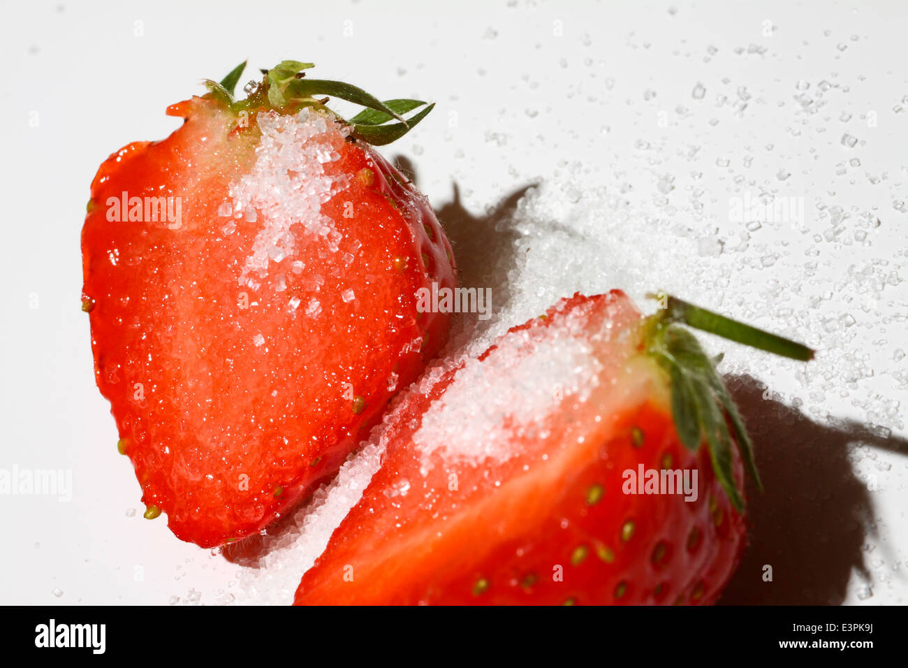 Strawberries covered with sugar Stock Photo Alamy