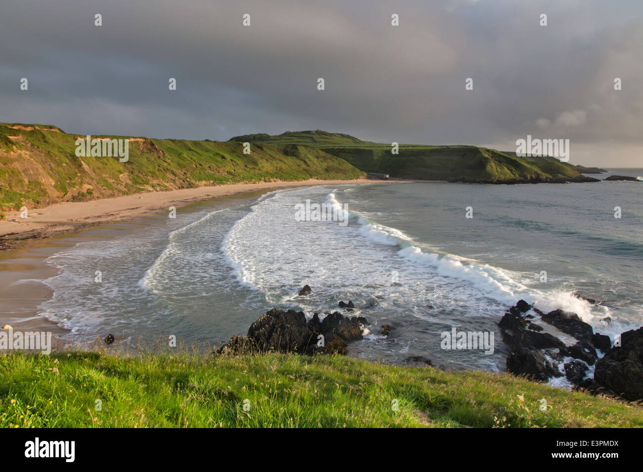 Storm clouds over Porth Oer or Whistling Sands on the  Llŷn Peninsula Heritage Coast, Snowdonia, Wales, UK Stock Photo
