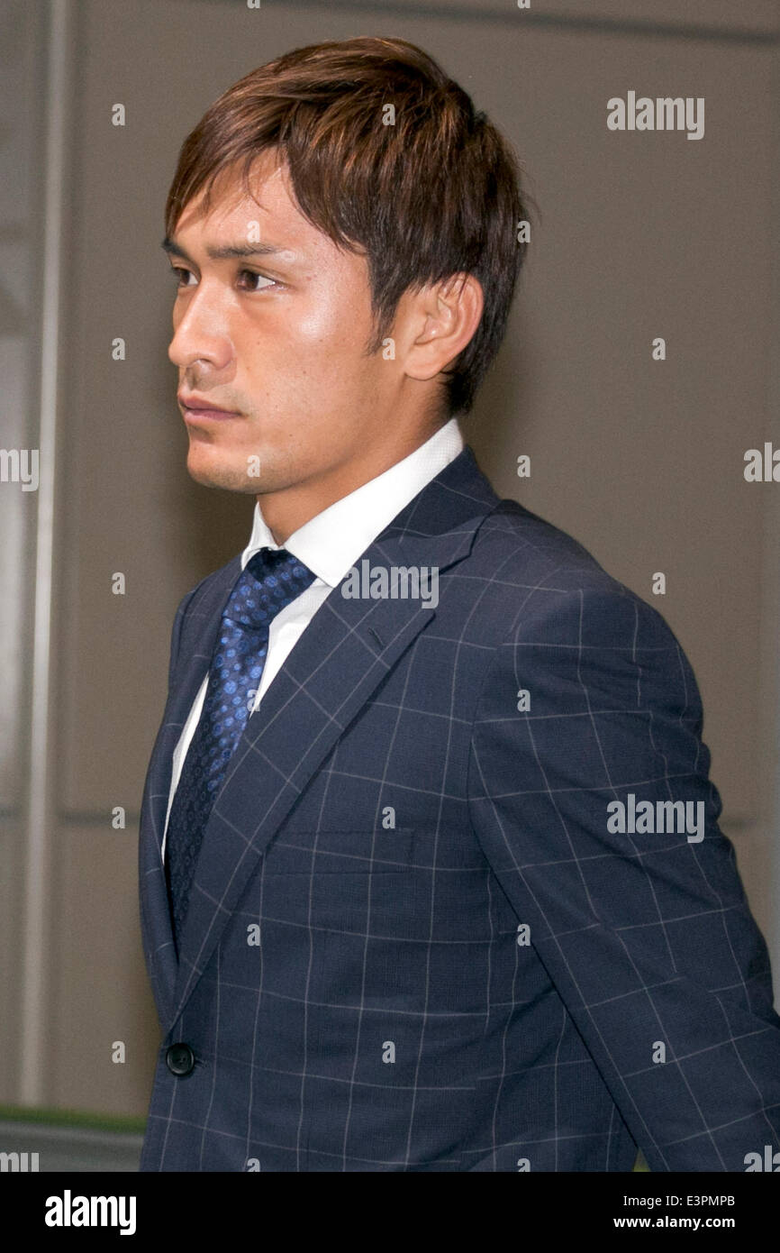 Chiba, Japan. 27th June, 2014. Japan national football team, Toshihiro Aoyama, June 27, 2014, Chiba, Japan - Toshihiro Aoyama arrives at Narita International Airport with other members of the Japan national football team. Members of the Japan national football team arrives at Narita with a disappointed look on their faces. They couldn't advance to the final 16 in '2014 FIFA World Cup Brazil' and came back earlier. Credit:  Rodrigo Reyes Marin/AFLO/Alamy Live News Stock Photo