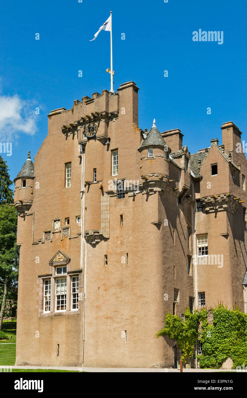 CRATHES CASTLE THE MAIN FACADE WITH CLOCK AND TURRETS ABERDEENSHIRE SCOTLAND Stock Photo