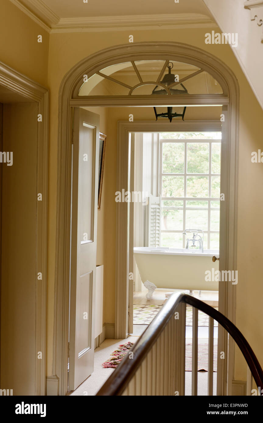 Staircase landing with view through to bathroom Stock Photo