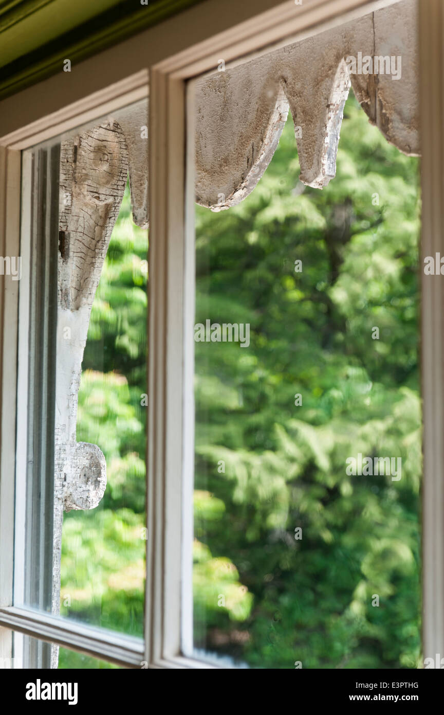 View through window to pane to exterior architectural detail Stock Photo