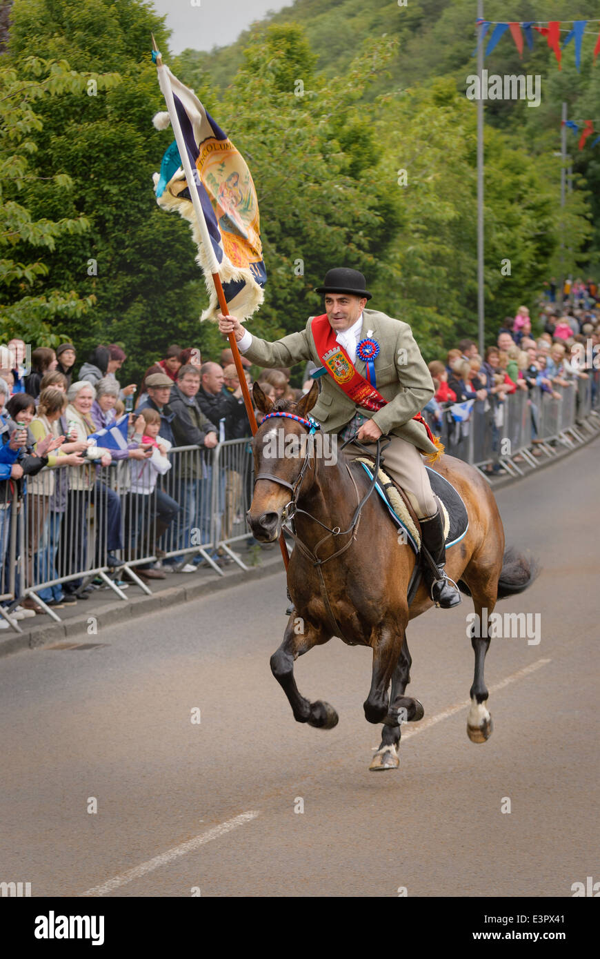 Selkirk Common Riding 2011. The Standard Bearer gallops in at the Toll