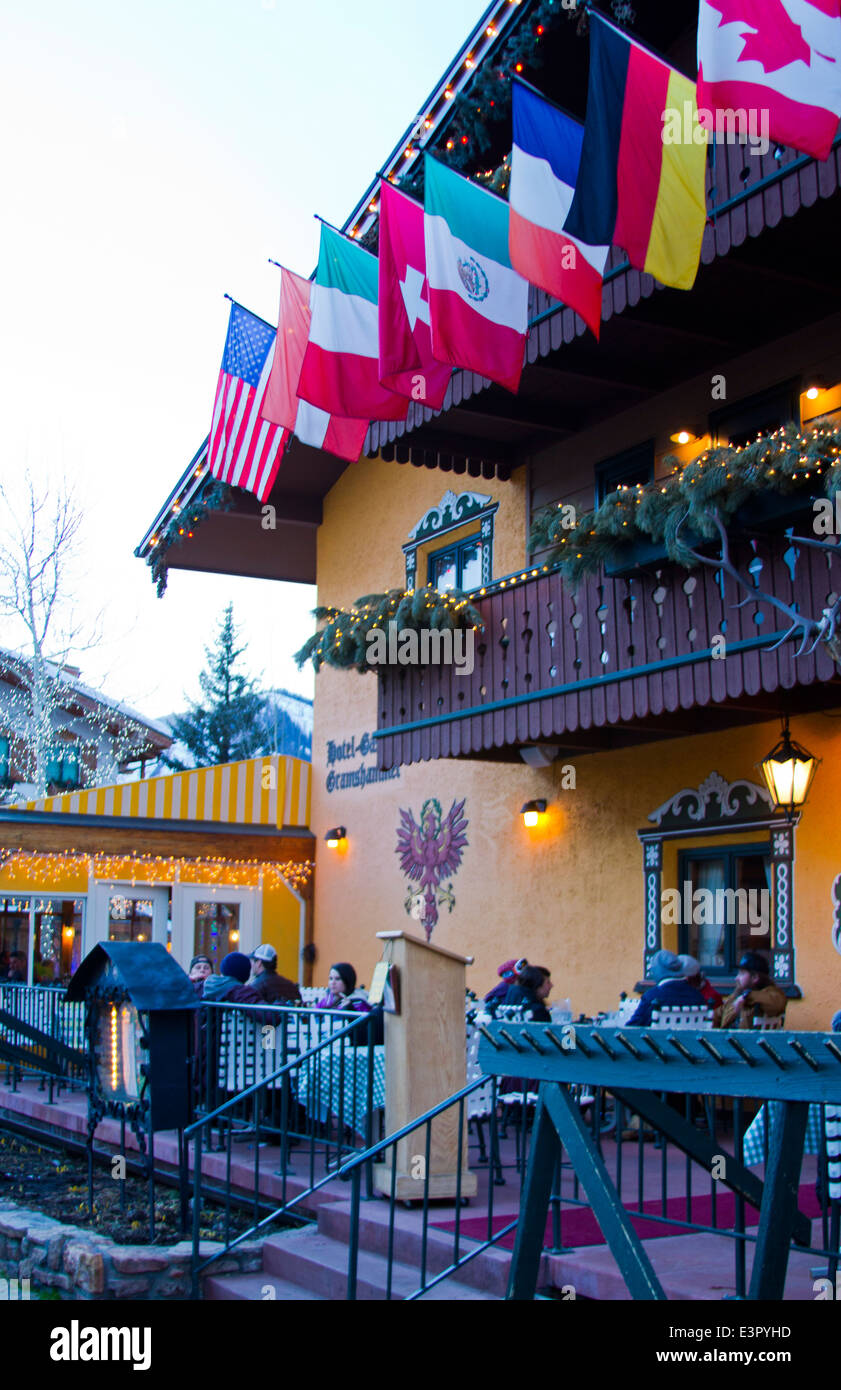 Vail Colorado town in winter time with Christmas lights and flags on