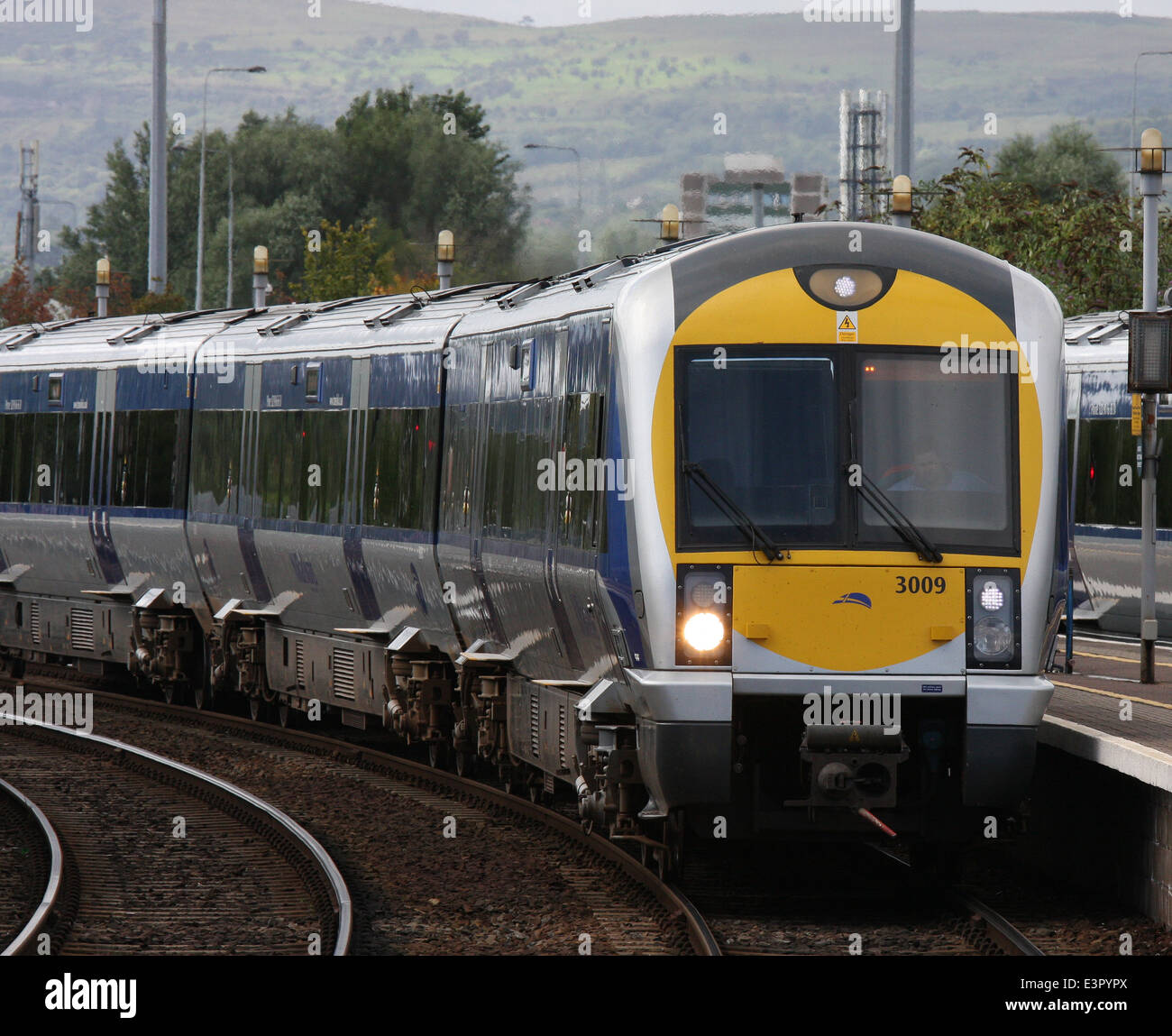 Train arriving at Great Victoria Street Station in Belfast Northern Ireland Stock Photo