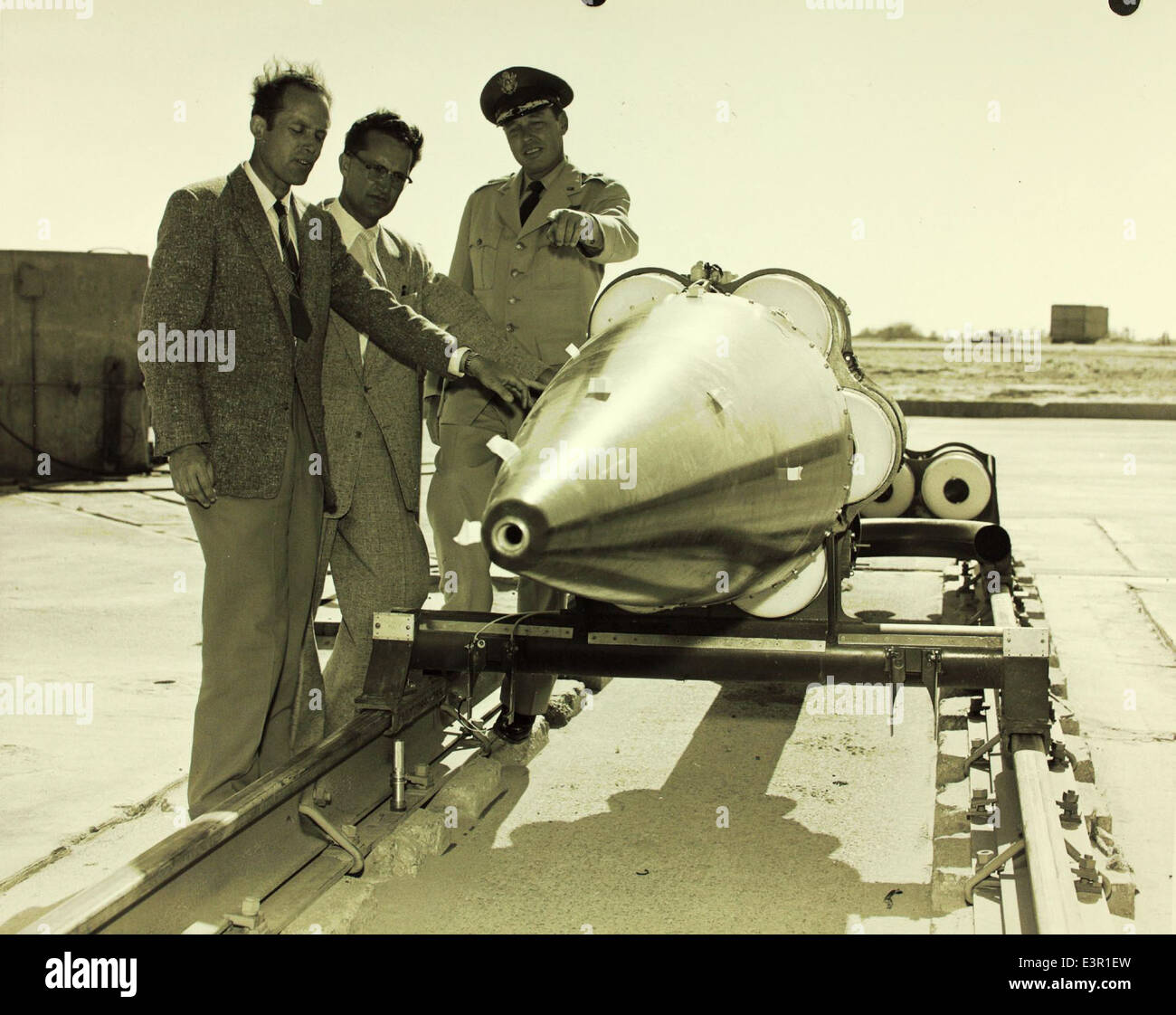 This image features Convair/General Dynamics personnel testing a rocket ...