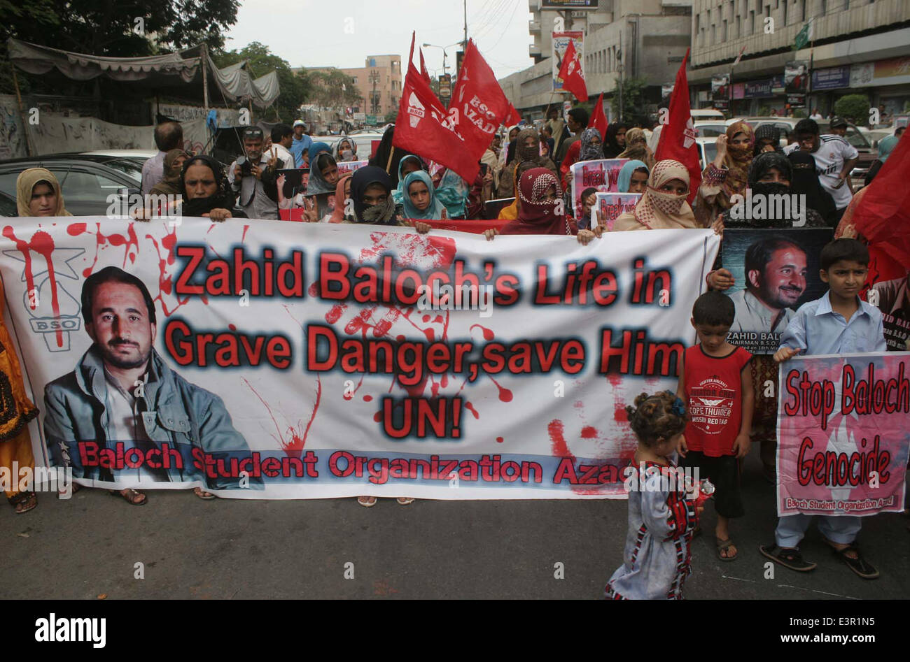 Activists of Baloch Students Organization (Azad) are protesting against forced missing of Zahid Baloch as they are demanding for his immediate recovery during a protest demonstration held at Karachi press club on Friday, June 27, 2014. Stock Photo