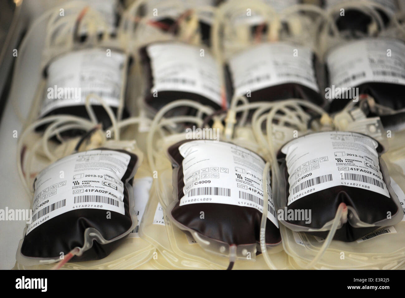 Blood bottles are laying on a table in the blood donation centre of the universityclinic in