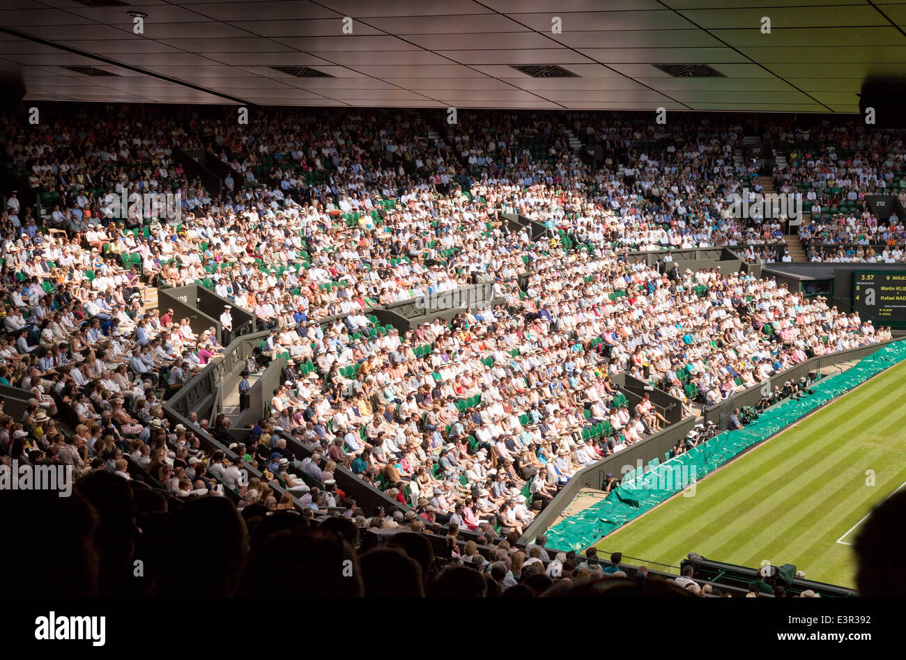 Centre Court crowd of spectators, Wimbledon All England Lawn Tennis Club Championships, Wimbledon London UK Stock Photo