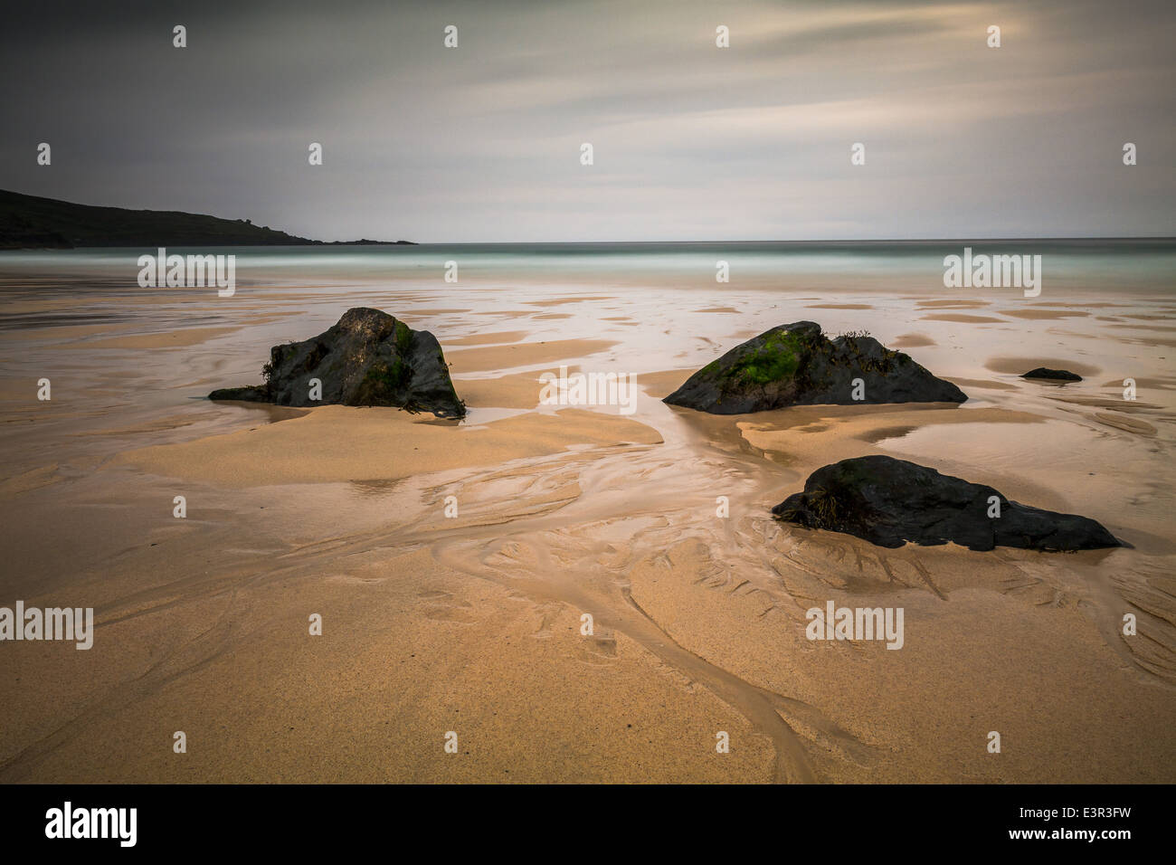 3 rocks at low tide on Porthmeor beach, Cornwall Stock Photo - Alamy