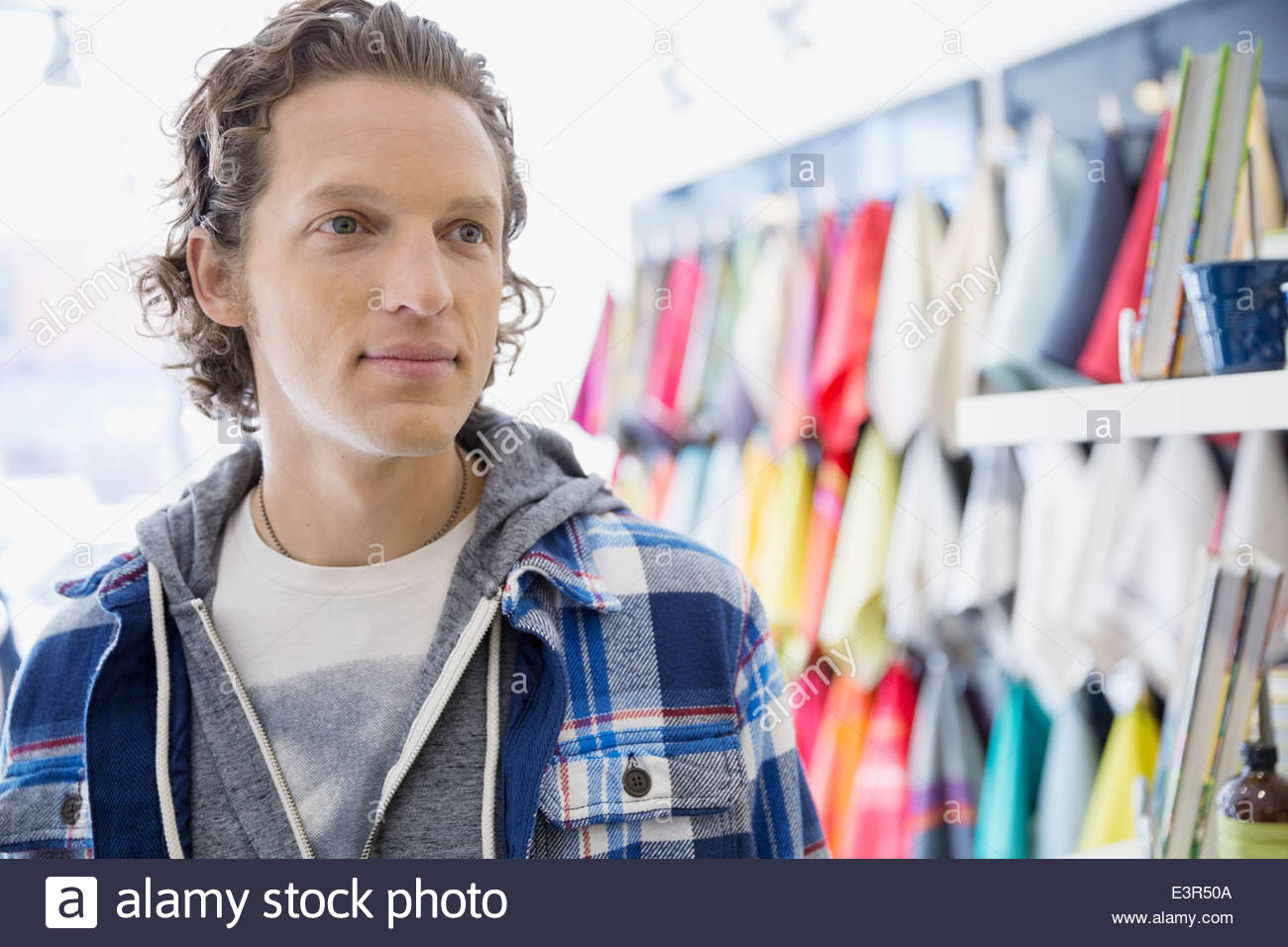 Man in linens shop Stock Photo Alamy