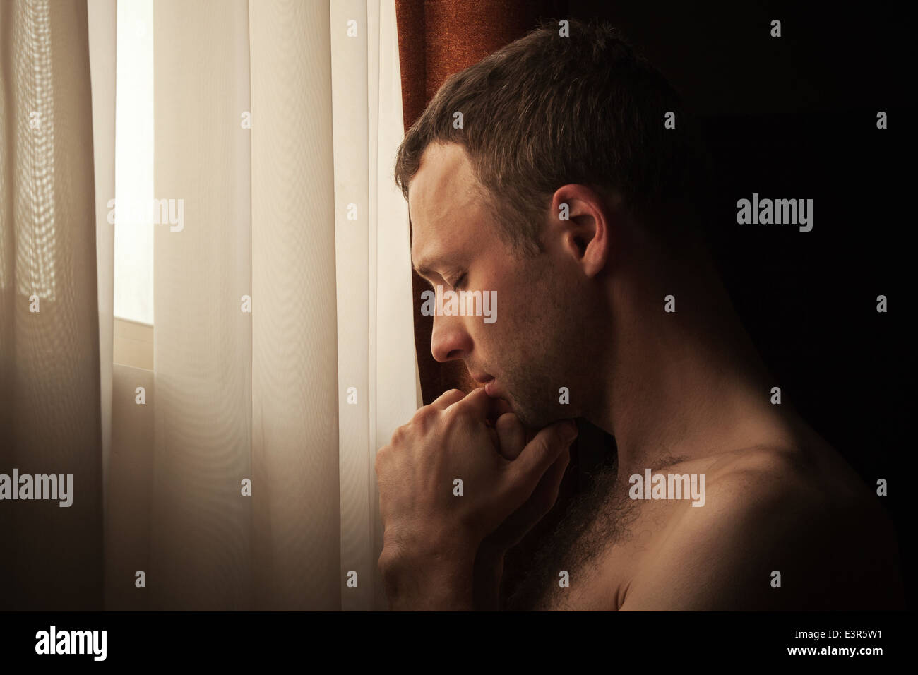 Man with eyes closed close up serious hi-res stock photography and