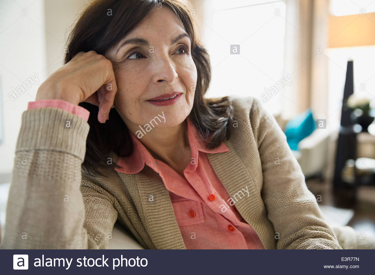 Pensive woman looking away Stock Photo