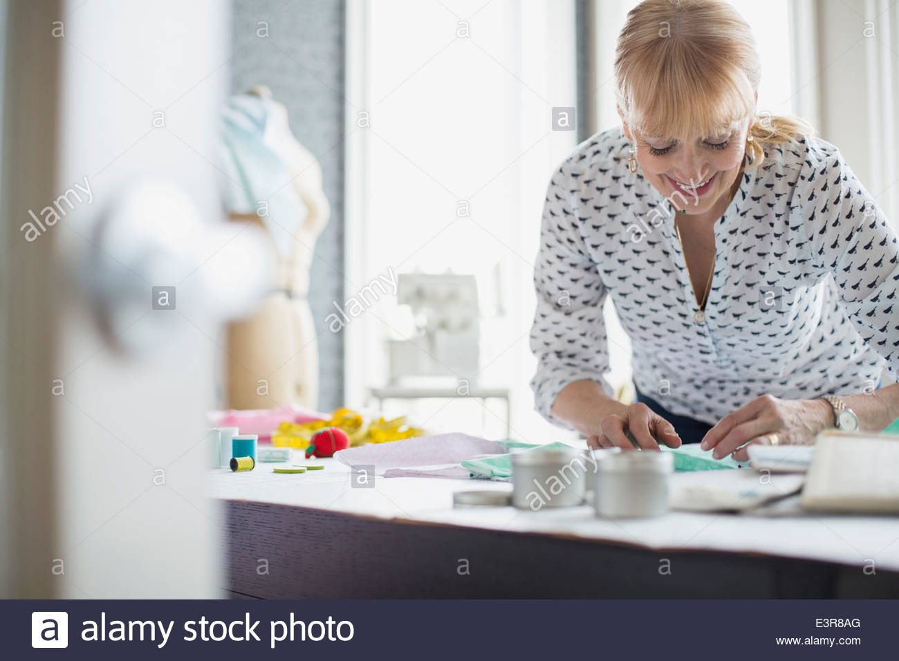 Seamstress working with pattern Stock Photo