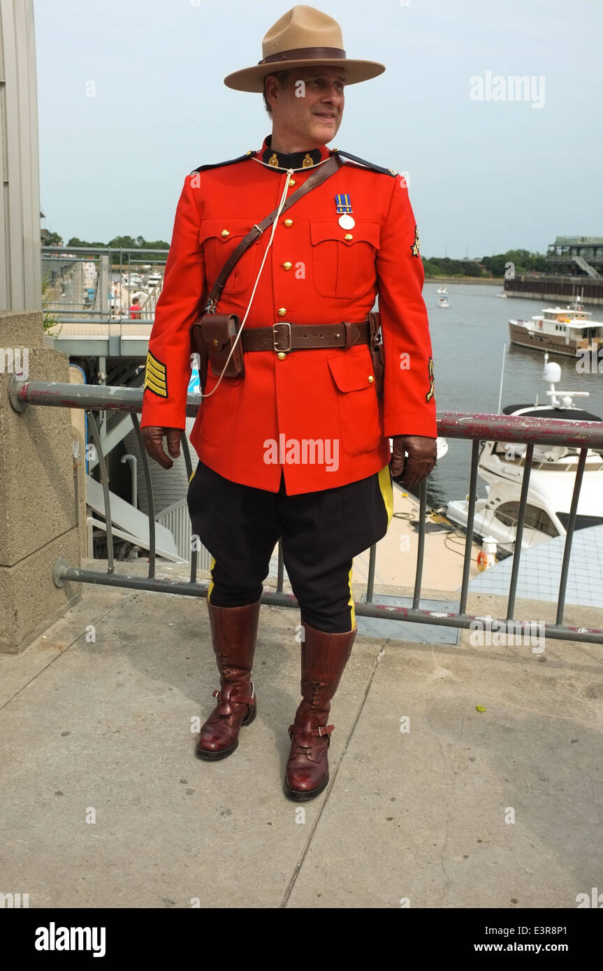 An RCMP officer in uniform during Canada Day celebrations in the Old Port of Montreal, Quebec. Stock Photo