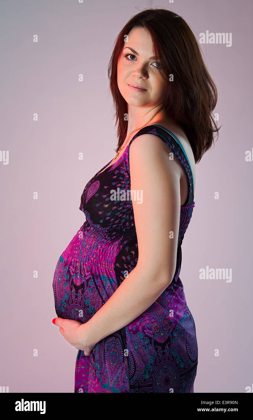 European Preego Beautiful european pregnant woman isolated over a light background ...