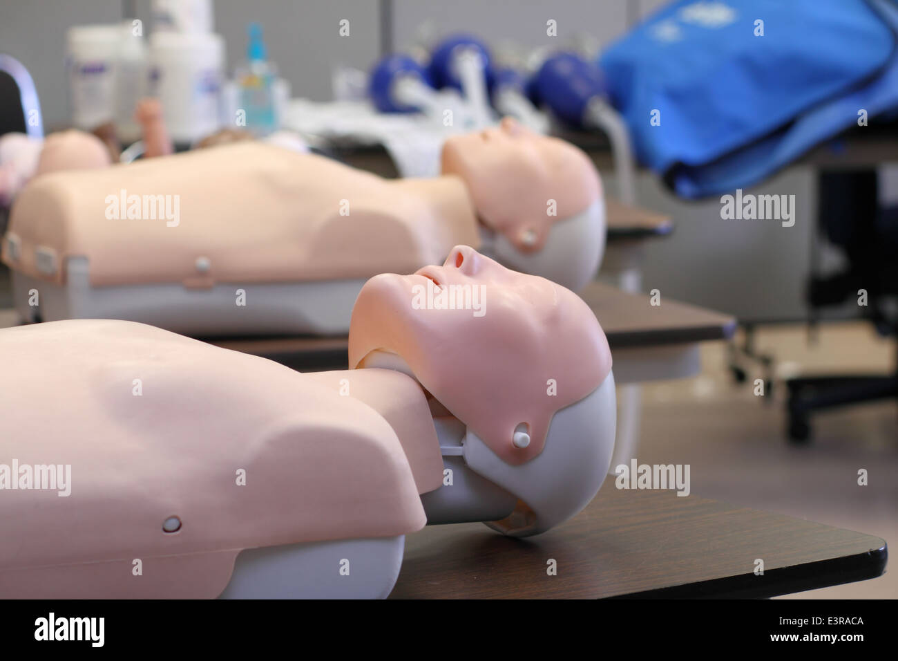 CPR training dummy in a classroom on a table. Stock Photo