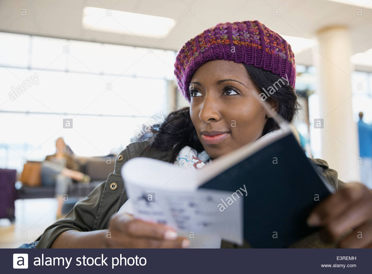 Reading book airport hi-res stock photography and images - Alamy