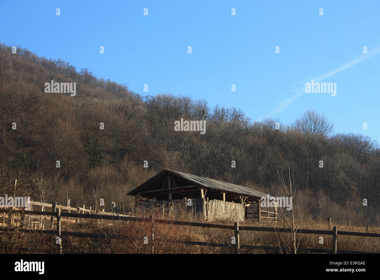 Traditional Romanian sheepfold in green landscape. Stock Photo