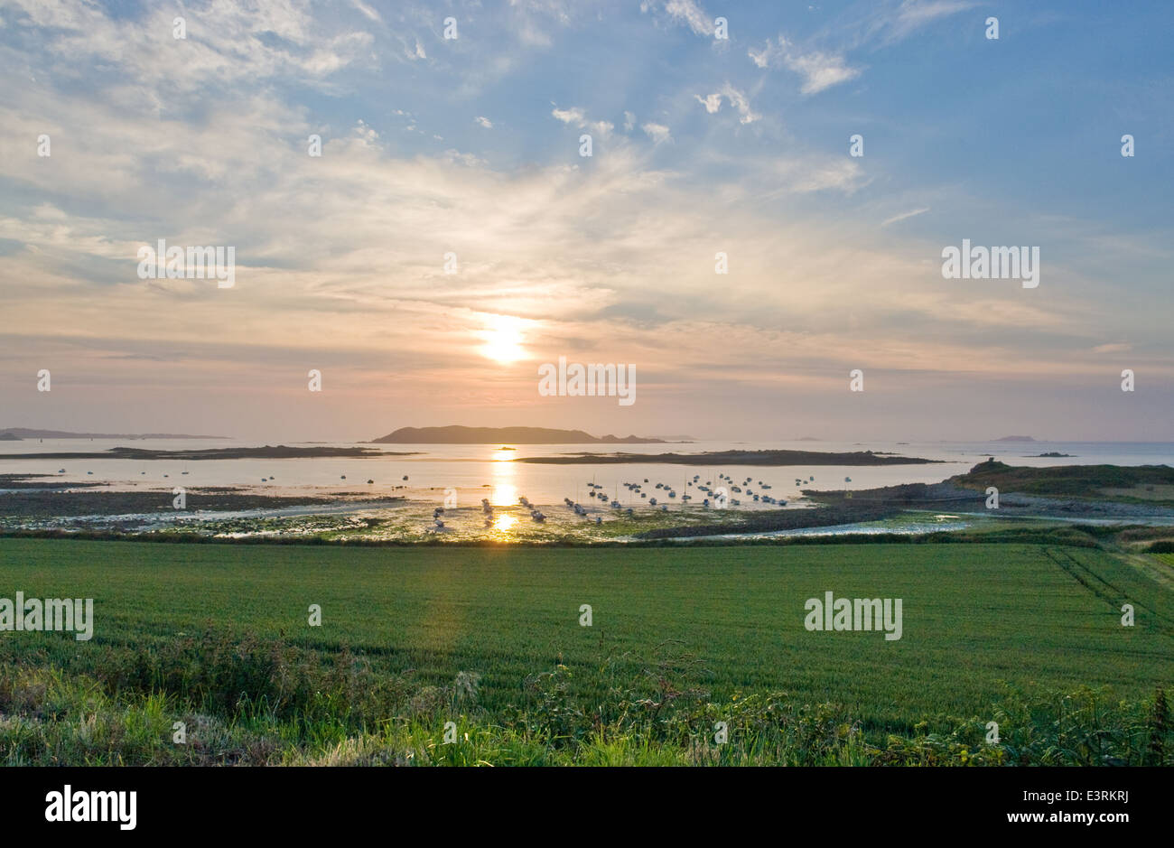 idyllic sundown with some boats at the Pink Granite Coast in Brittany, France Stock Photo Alamy